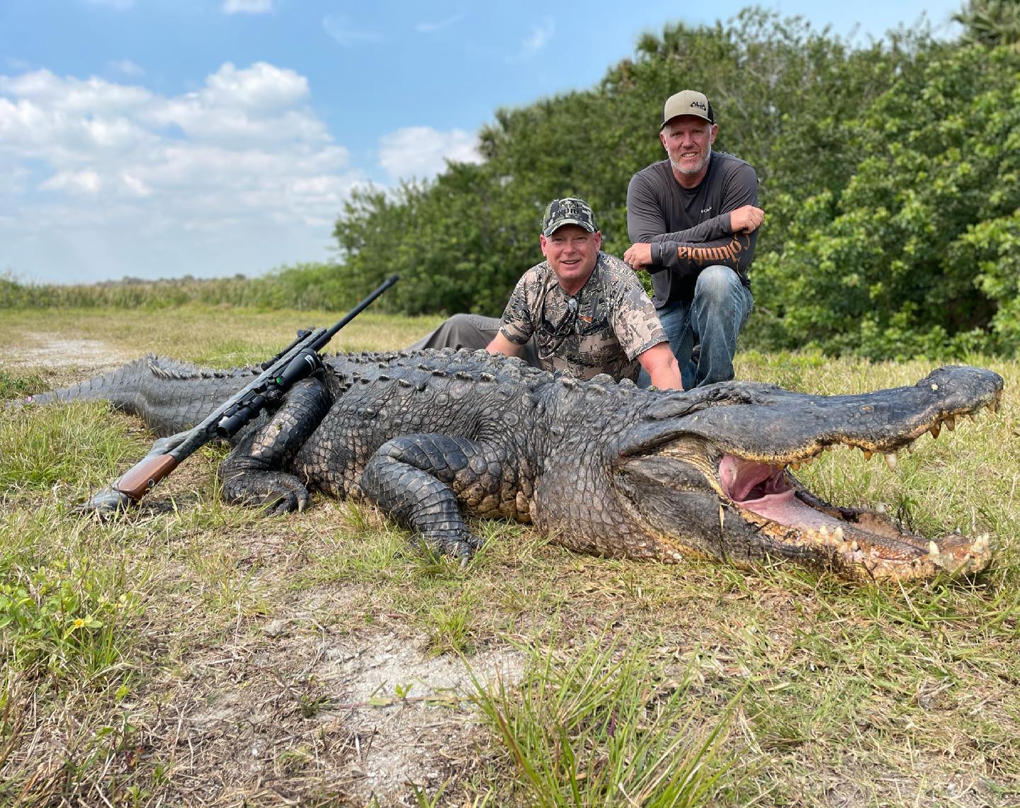 Two men with trophy gator in Florida.