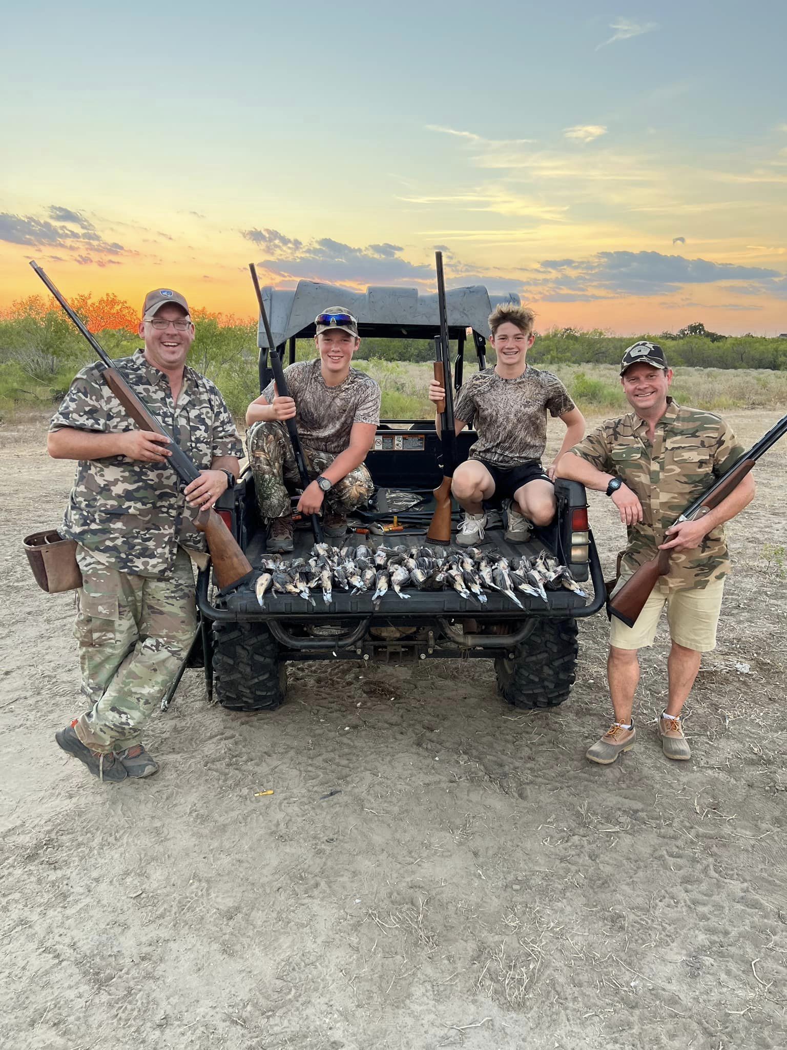 Two men and a child shown with a gator harvested during Louisiana's gator season